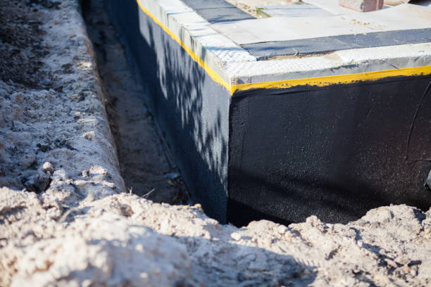 Professional Basement Waterproofing technician working in Spring Lake, NJ